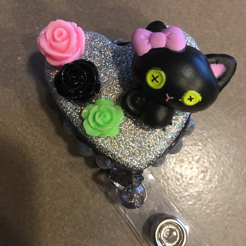 Lalaloopsy Cat badge reel